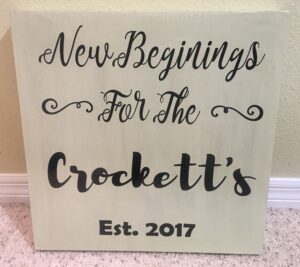 A decorative sign with the text 'New Beginnings For The Crockett's Est. 2017'.