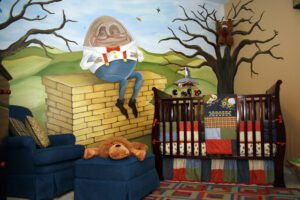 Surreal scene with a giant head reading on a brick wall and a crib under a barren tree.