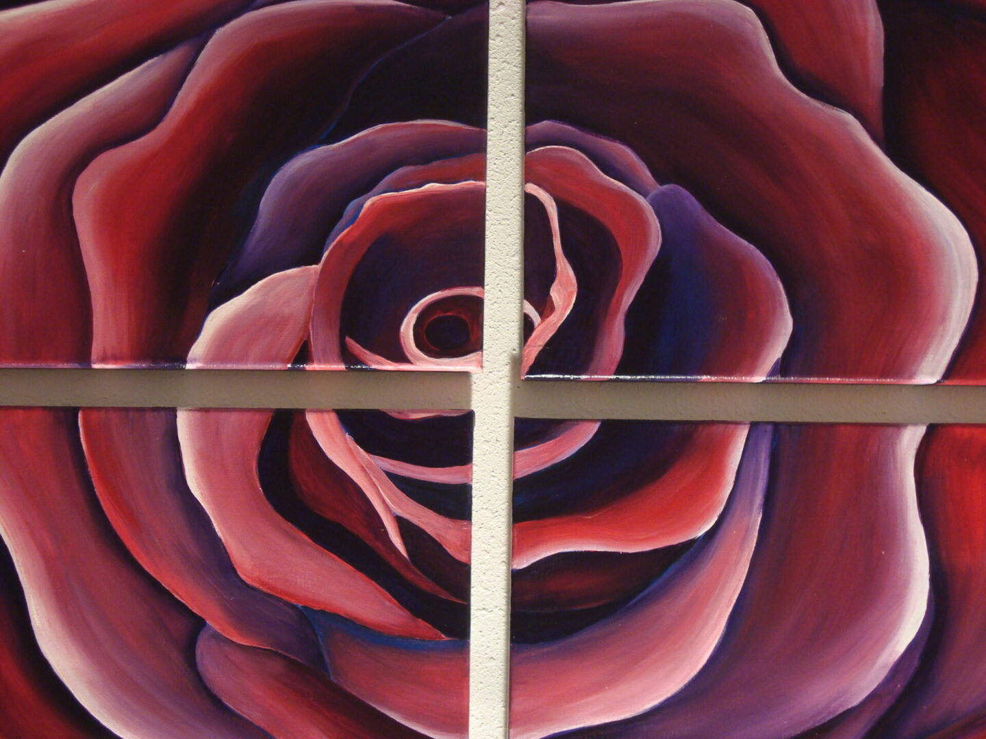 Abstract red rose painting, divided quadrants.