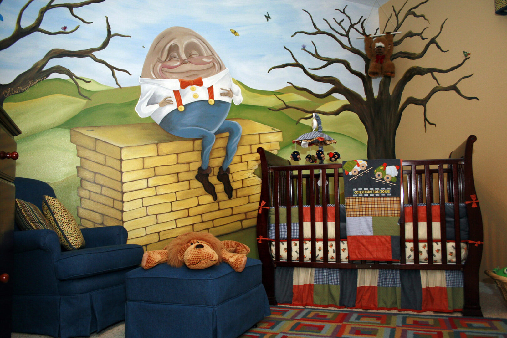 Nursery with Humpty Dumpty mural and crib.