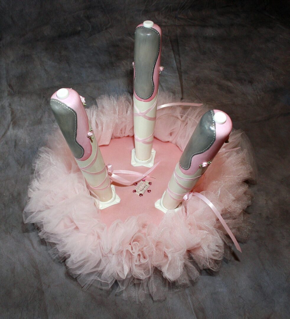 Pink ballet slipper-themed cake with tulle.