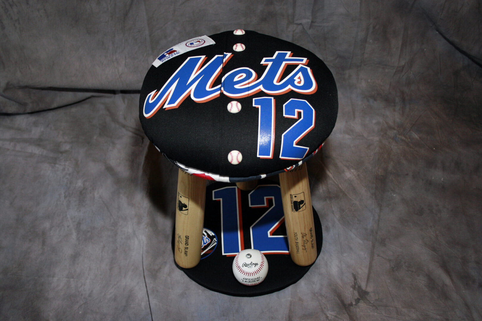 Baseball-themed stool with Mets design.